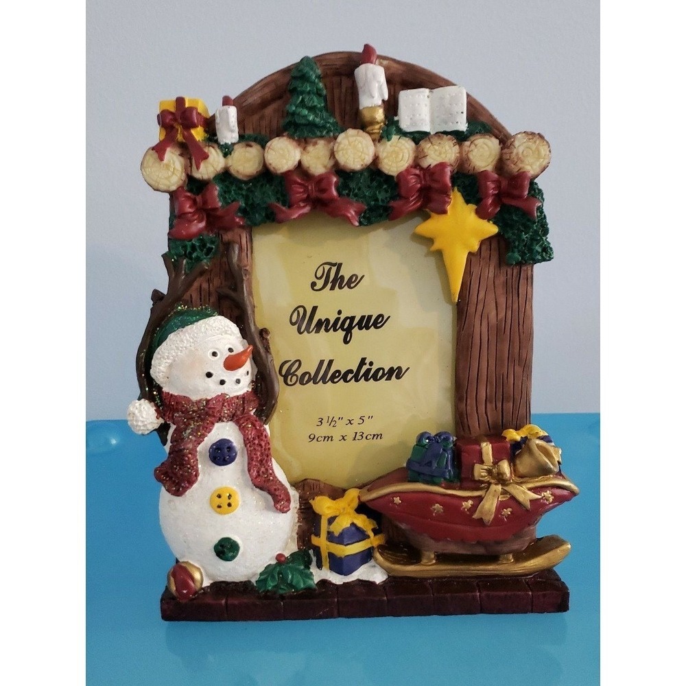 Sleigh Hill Snowman pictures frame